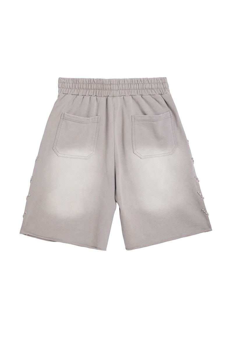 On Time Fashions grey terry cloth shorts with rhinestone detailing on the sides and elastic waistband.