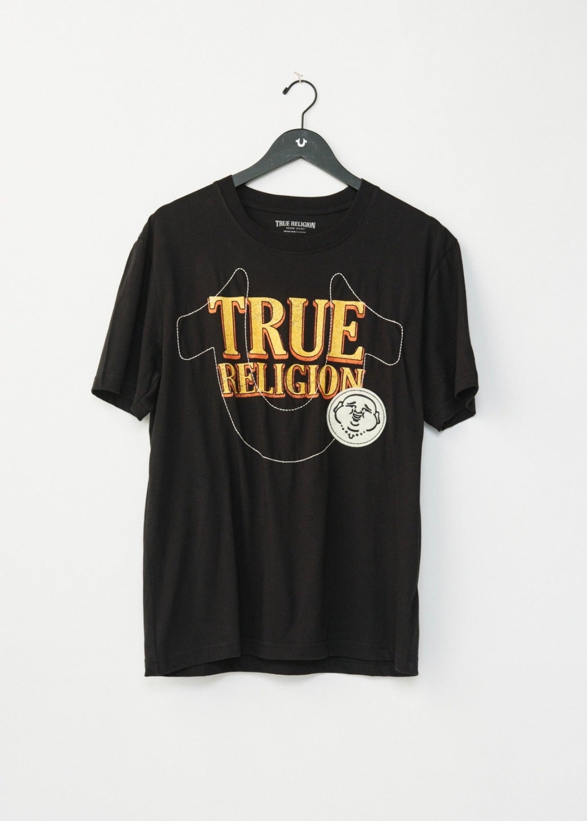 True Religion Western Logo HS Tee from On Time Fashions – Graphic Tee by True Religion, Birmingham AL’s 1 fashion store and premier destination for streetwear, suits, kids fashion, and big & tall