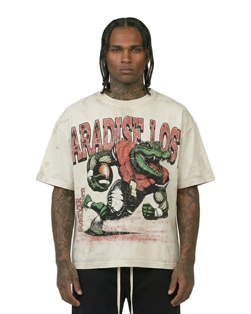 Person wearing a 'Paradise Lost' t-shirt with graphic design on a plain background