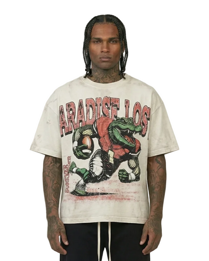 Person wearing a 'Paradise Lost' t-shirt with graphic design on a plain background