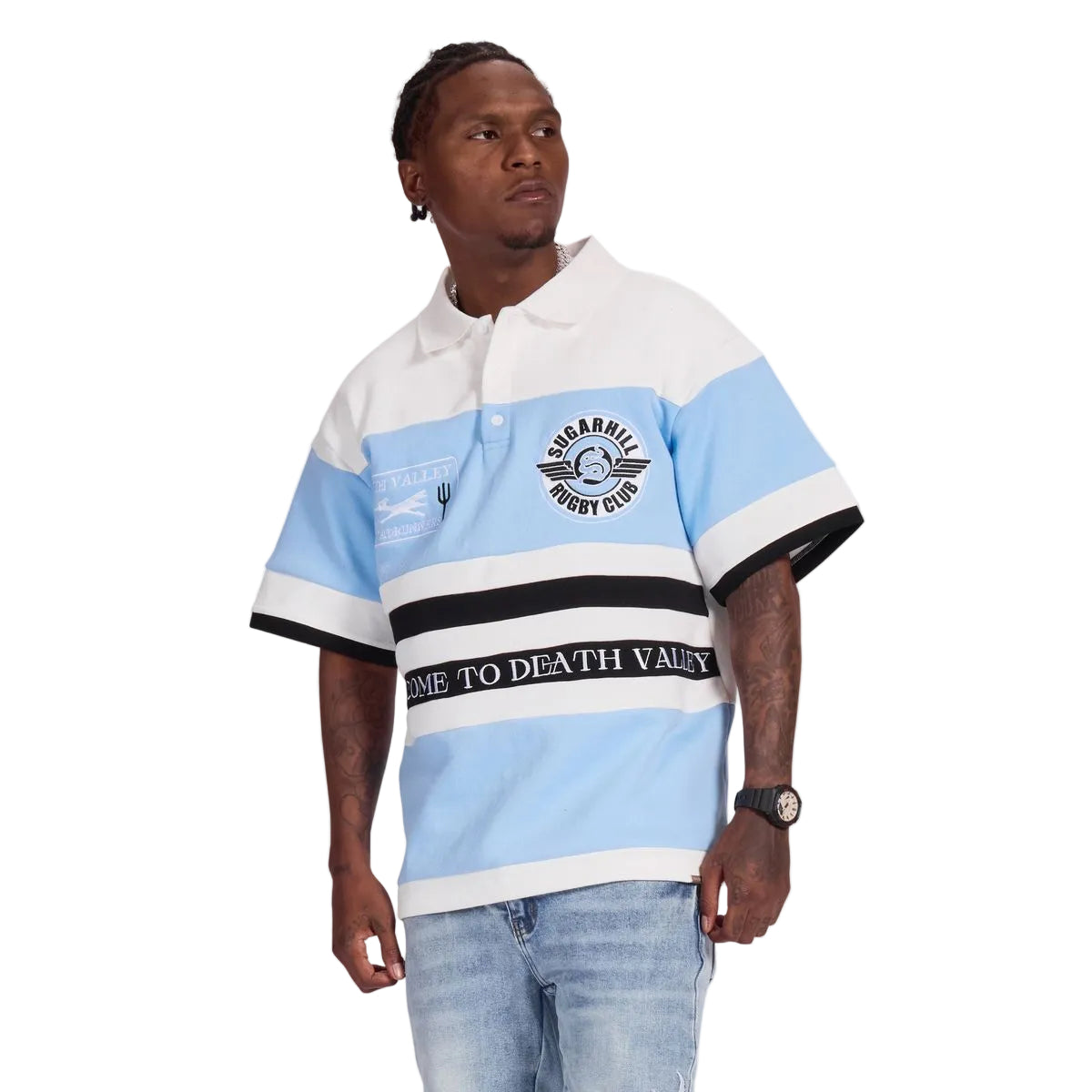Man wearing a light blue and white striped polo shirt with text on a white background
