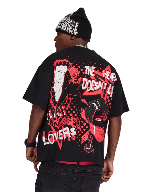 Person wearing a black t-shirt with red and white graphic design and text on the back.