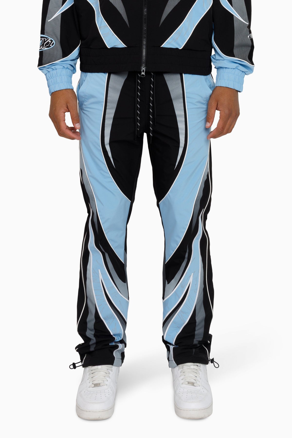 Smoke Rise Rising Colorblock Windbreaker Pants in Blue Bell front view