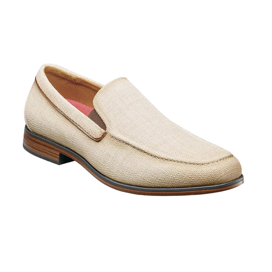 Beige loafer shoe on a white background