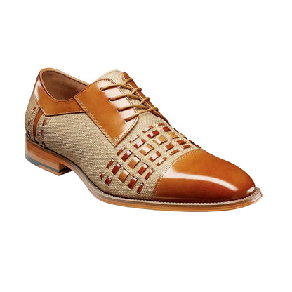 Brown and beige dress shoe on a white background
