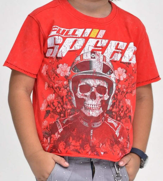 Child wearing a red t-shirt with a graphic design featuring a skull and text.