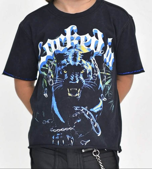 Child wearing a black t-shirt with a blue panther graphic design on a white background