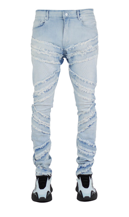 Light blue distressed jeans on a white background