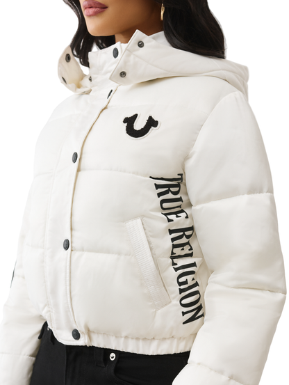 White puffer jacket with 'True Religion' branding on a white background