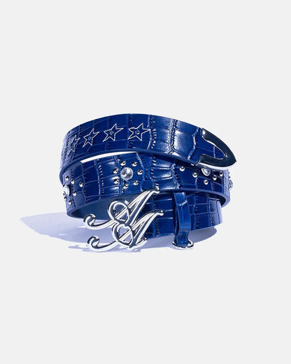 Ad Astra Caiman belt in blue, coiled view with monogram buckle