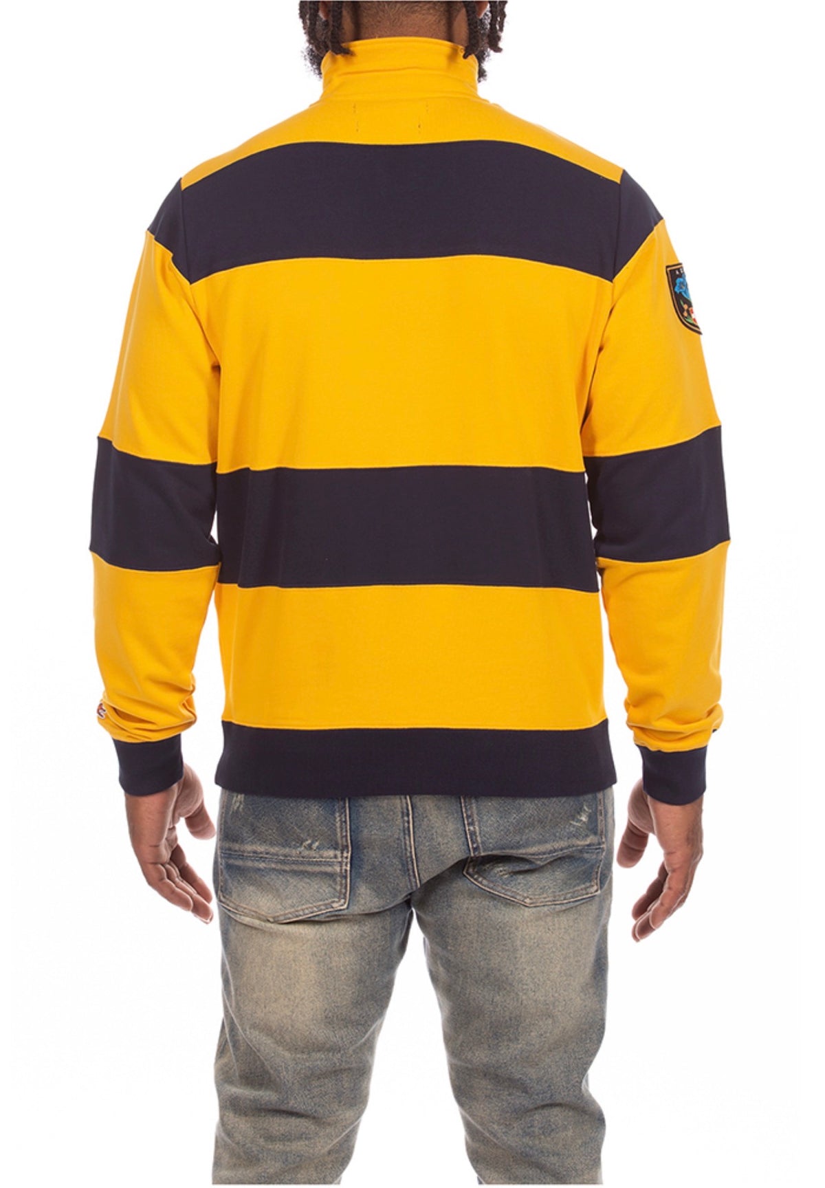 AKOO Creed Fleece in Old Gold with navy stripes back view