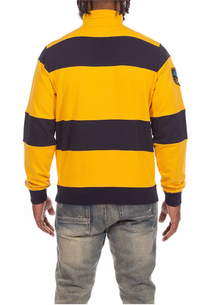AKOO Creed Fleece in Old Gold with navy stripes back view