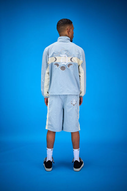 DUAA teal top and shorts front view