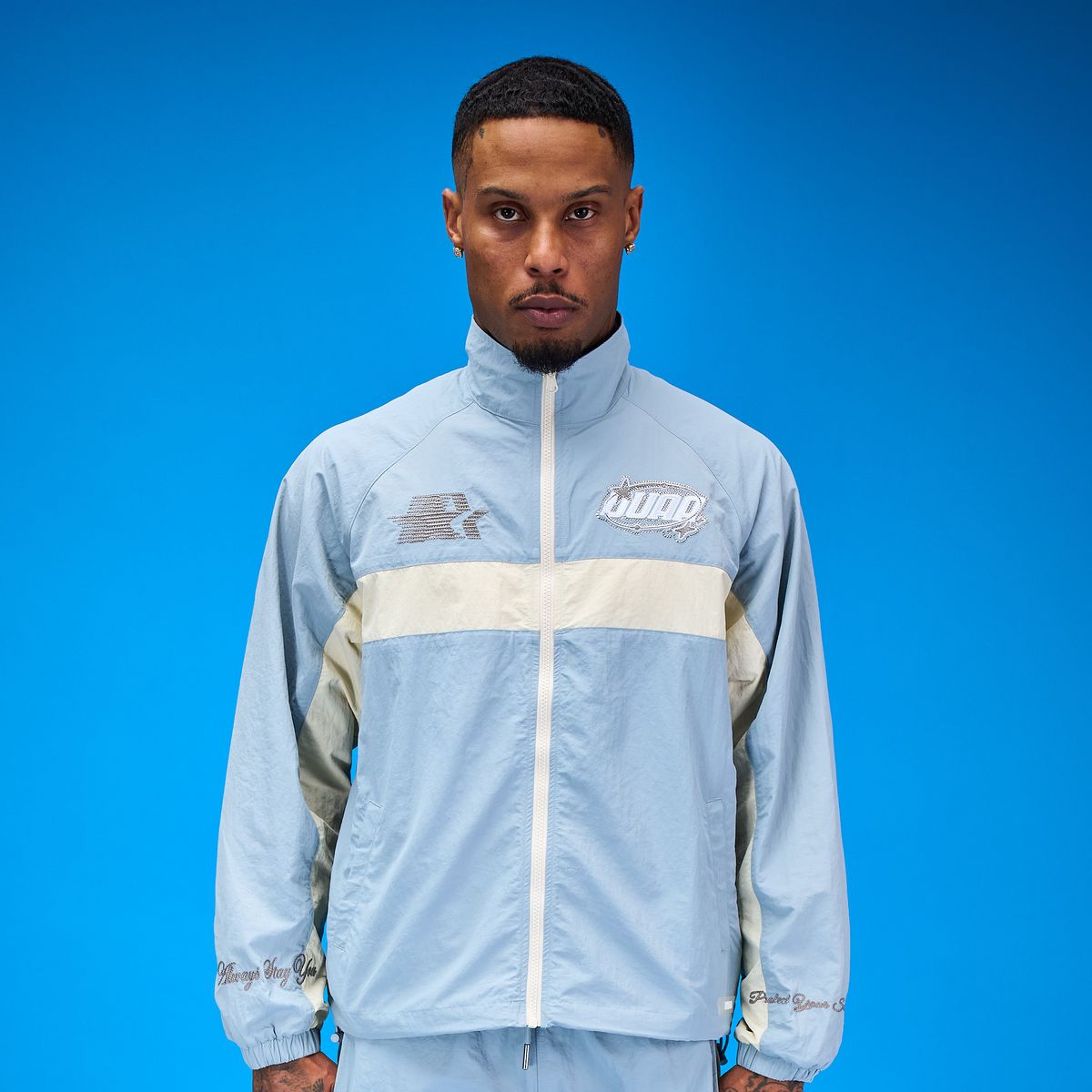 DUAA teal full-zip track top