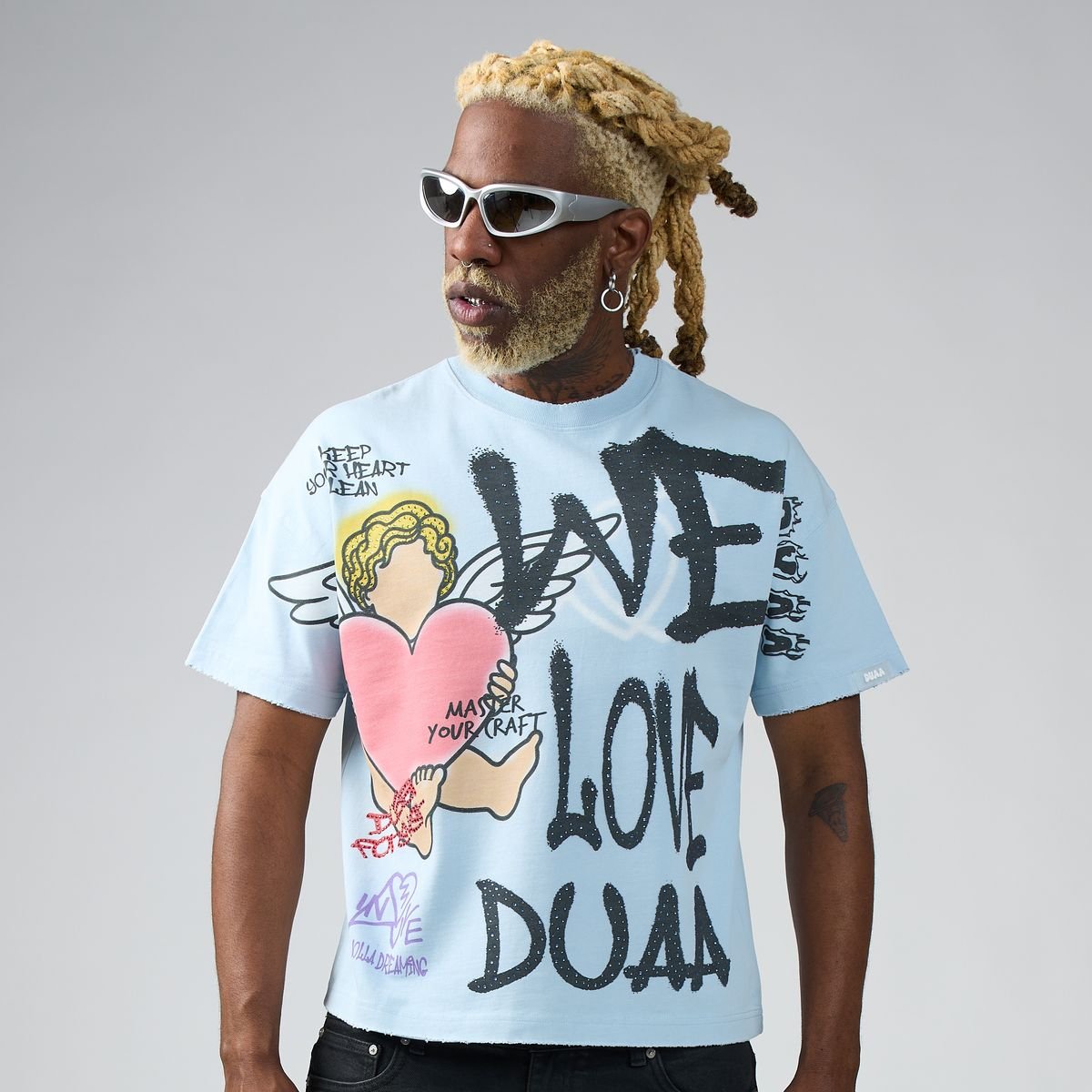 Duaa We Love Tee from On Time Fashions – T-shirt by DUAA, Birmingham AL’s 1 fashion store and premier destination for streetwear, suits, kids fashion, and big & tall