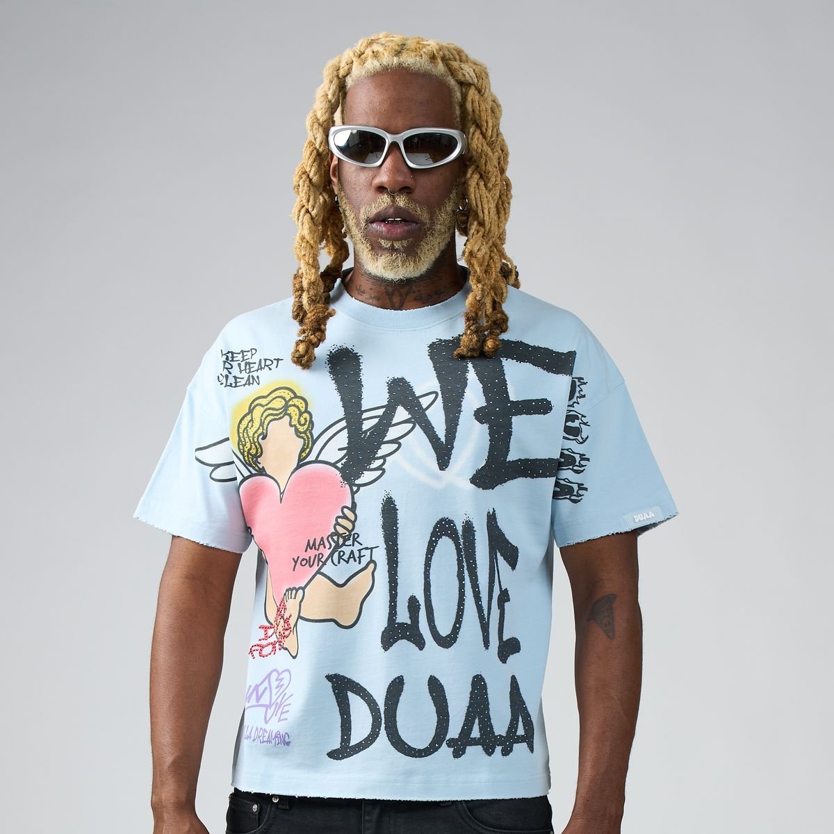 Duaa We Love Tee from On Time Fashions – T-shirt by DUAA, Birmingham AL’s 1 fashion store and premier destination for streetwear, suits, kids fashion, and big & tall