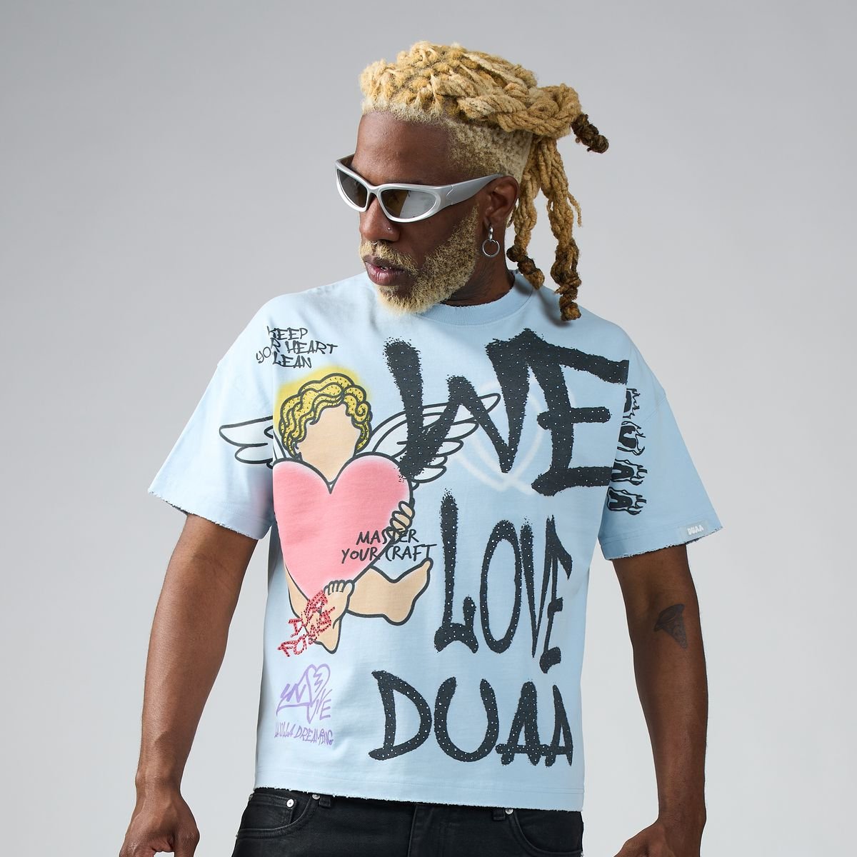 Duaa We Love Tee from On Time Fashions – T-shirt by DUAA, Birmingham AL’s 1 fashion store and premier destination for streetwear, suits, kids fashion, and big & tall