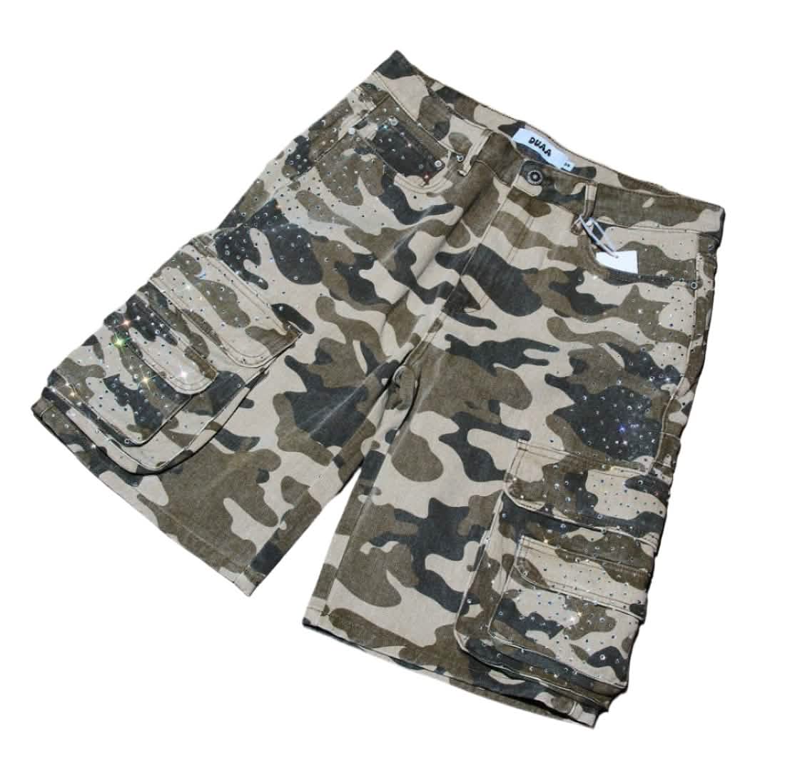 Camouflage shorts on a concrete floor