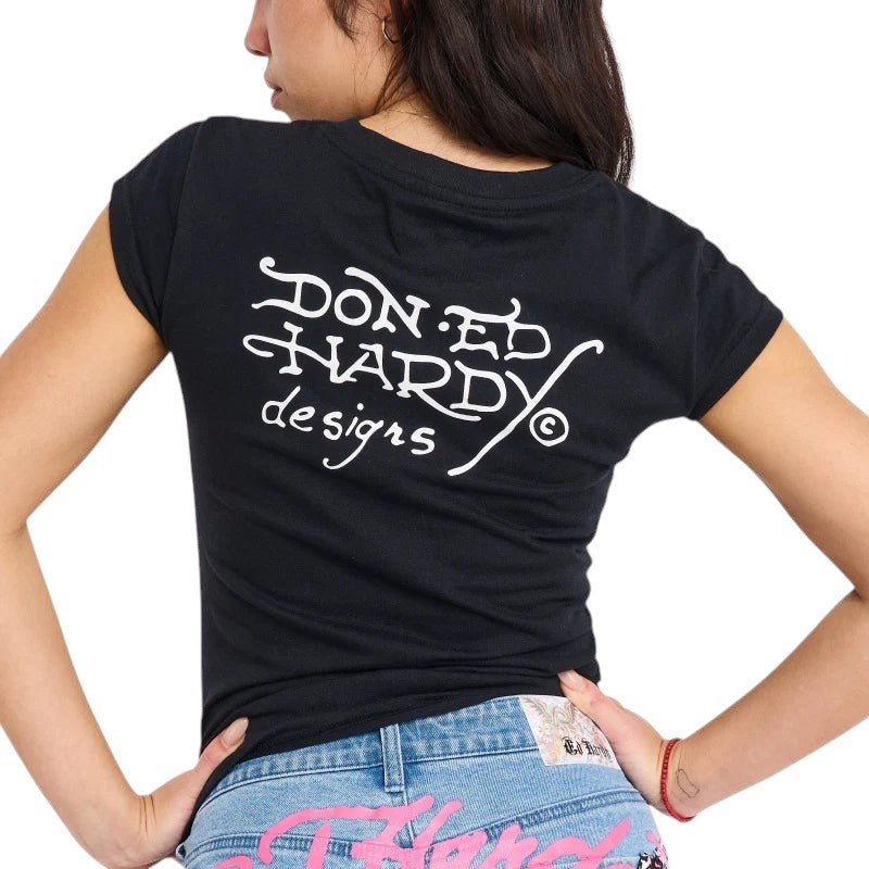 Ed Hardy Panther Dagger Rhinestone Cap Sleeve Tee from On Time Fashions – Women's tee by Ed Hardy, Birmingham AL’s 1 fashion store and premier destination for streetwear, suits, kids fashion, and big & tall