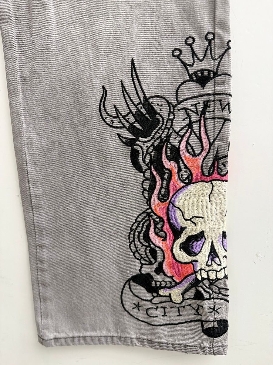 Ed Hardy Women's Pink Skull Flame Baggy Jeans from On Time Fashions – Women's Jeans by Ed Hardy, Birmingham AL’s 1 fashion store and premier destination for streetwear, suits, kids fashion, and big & tall