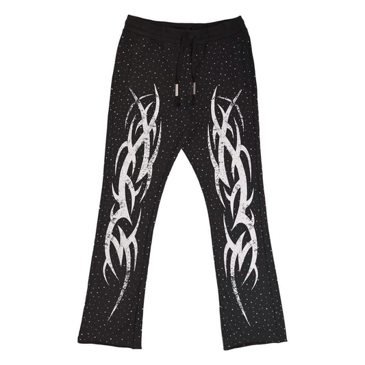 First Row Y2K Tribal Stud Joggers from On Time Fashions – Streetwear Pants Set by Huge USA, Birmingham AL’s 1 fashion store and premier destination for streetwear, suits, kids fashion, and big & tall