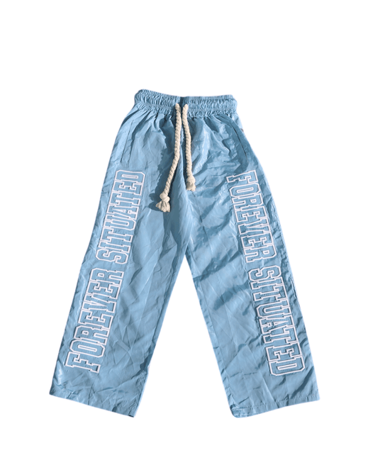 Forever Situated Nylon Track Pants from On Time Fashions – Track Pants by Forever Situated, Birmingham AL’s 1 fashion store and premier destination for streetwear, suits, kids fashion, and big & tall