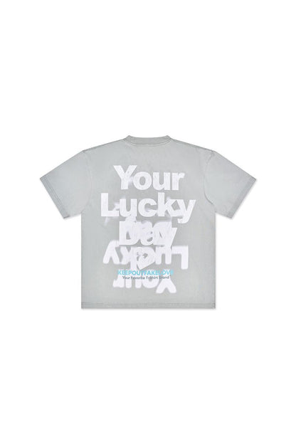 KOFL All Luck Tee from On Time Fashions – T-shirt by KOFL, Birmingham AL’s 1 fashion store and premier destination for streetwear, suits, kids fashion, and big & tall