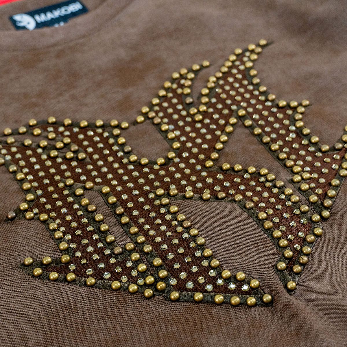 Makobi Lorenzino MK Crewneck from On Time Fashions – Sweater by Makobi, Birmingham AL’s 1 fashion store and premier destination for streetwear, suits, kids fashion, and big & tall