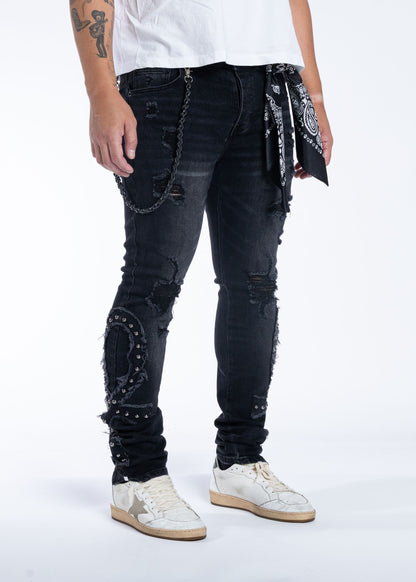Midnight Black Ankh black jeans with bandana and chain, angled view