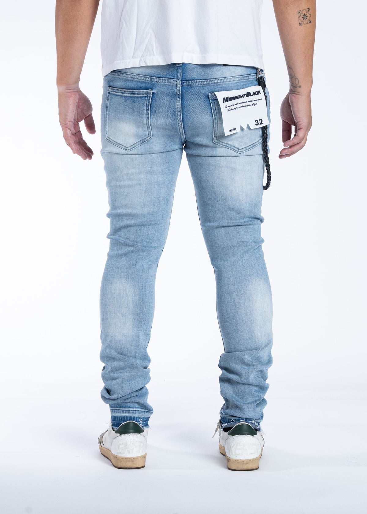 Midnight Black Stallions light blue jeans, back view