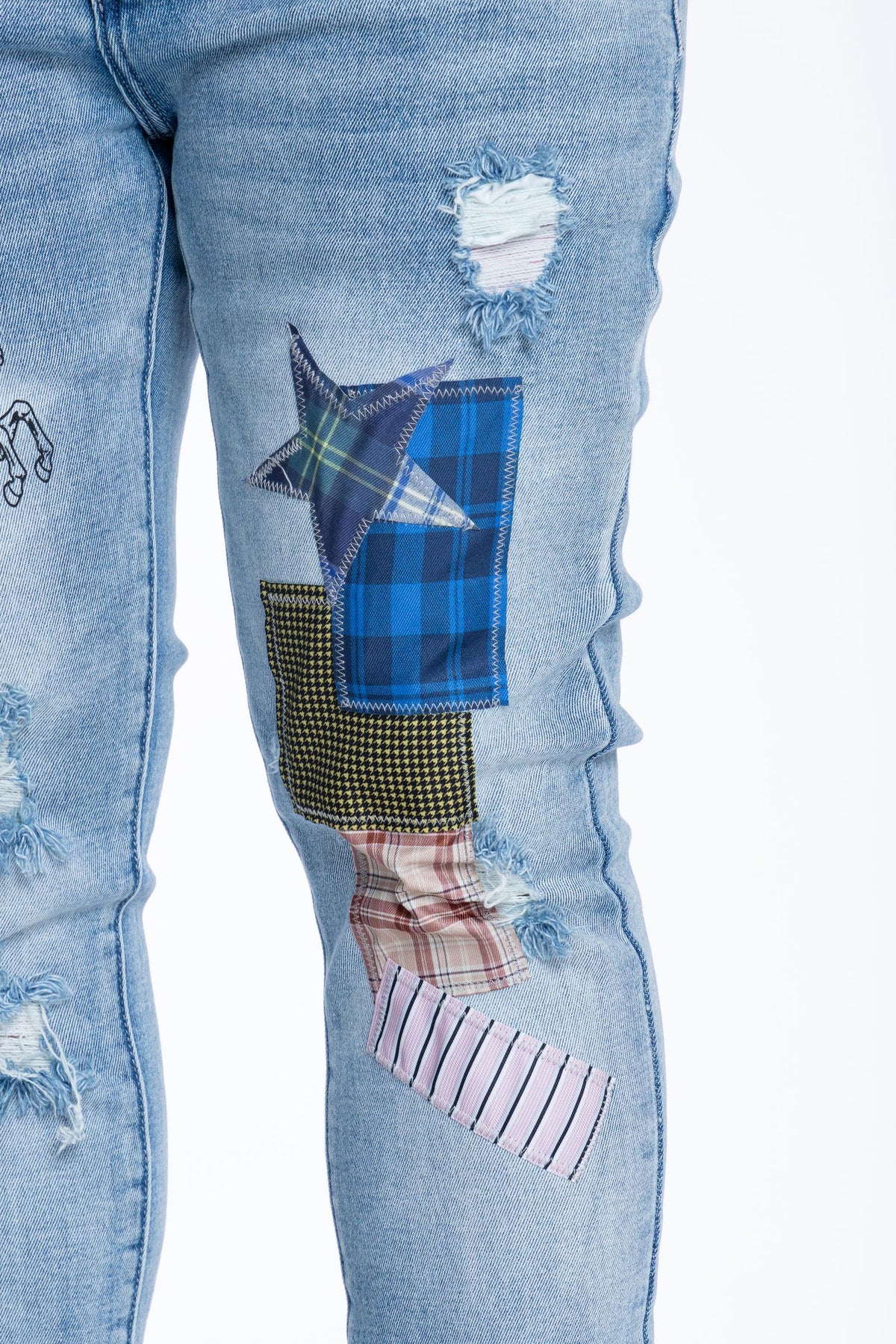 Plaid star and patchwork details on Stallions jeans