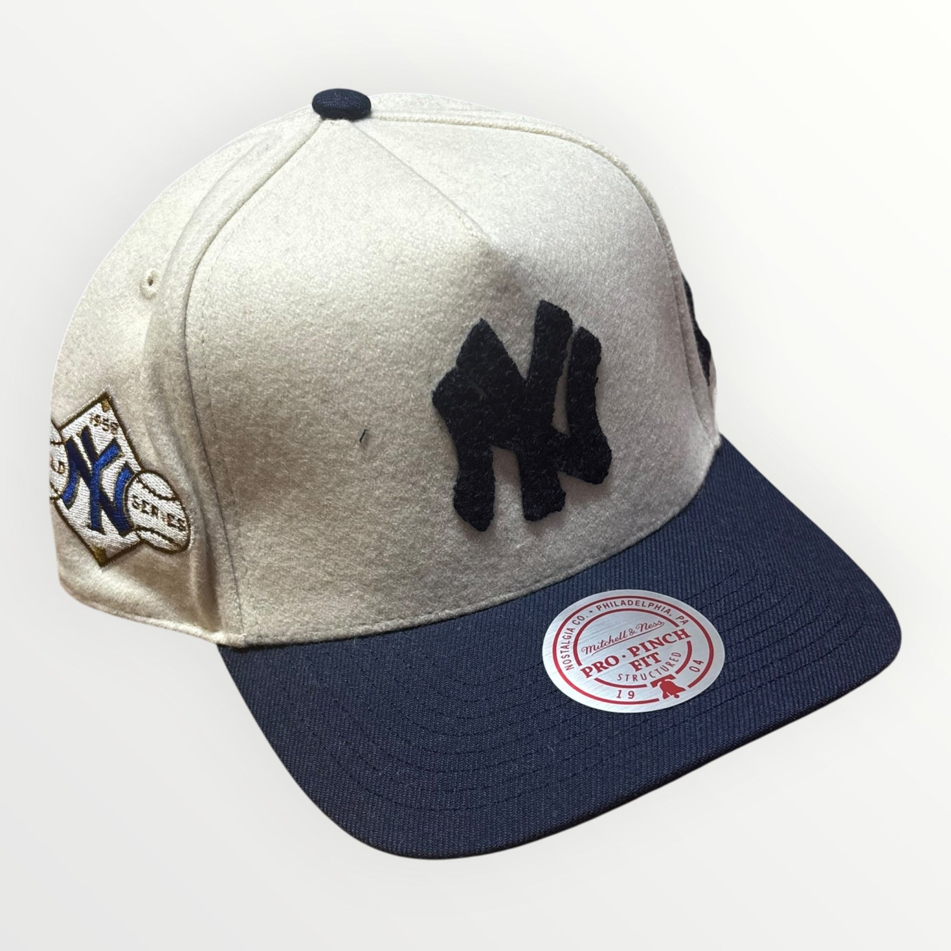 Mitchell & Ness New York Yankees Cream Team Pro Snapback from On Time Fashions – Snapback Hat by Mitchell & Ness, Birmingham AL’s 1 fashion store and premier destination for streetwear, suits, kids fashion, and big & tall