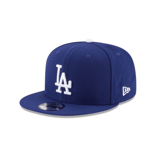 New Era Los Angeles Dodgers 9FIFTY Basic Snapback from On Time Fashions – Hat by New Era, Birmingham AL’s 1 fashion store and premier destination for streetwear, suits, kids fashion, and big & tall