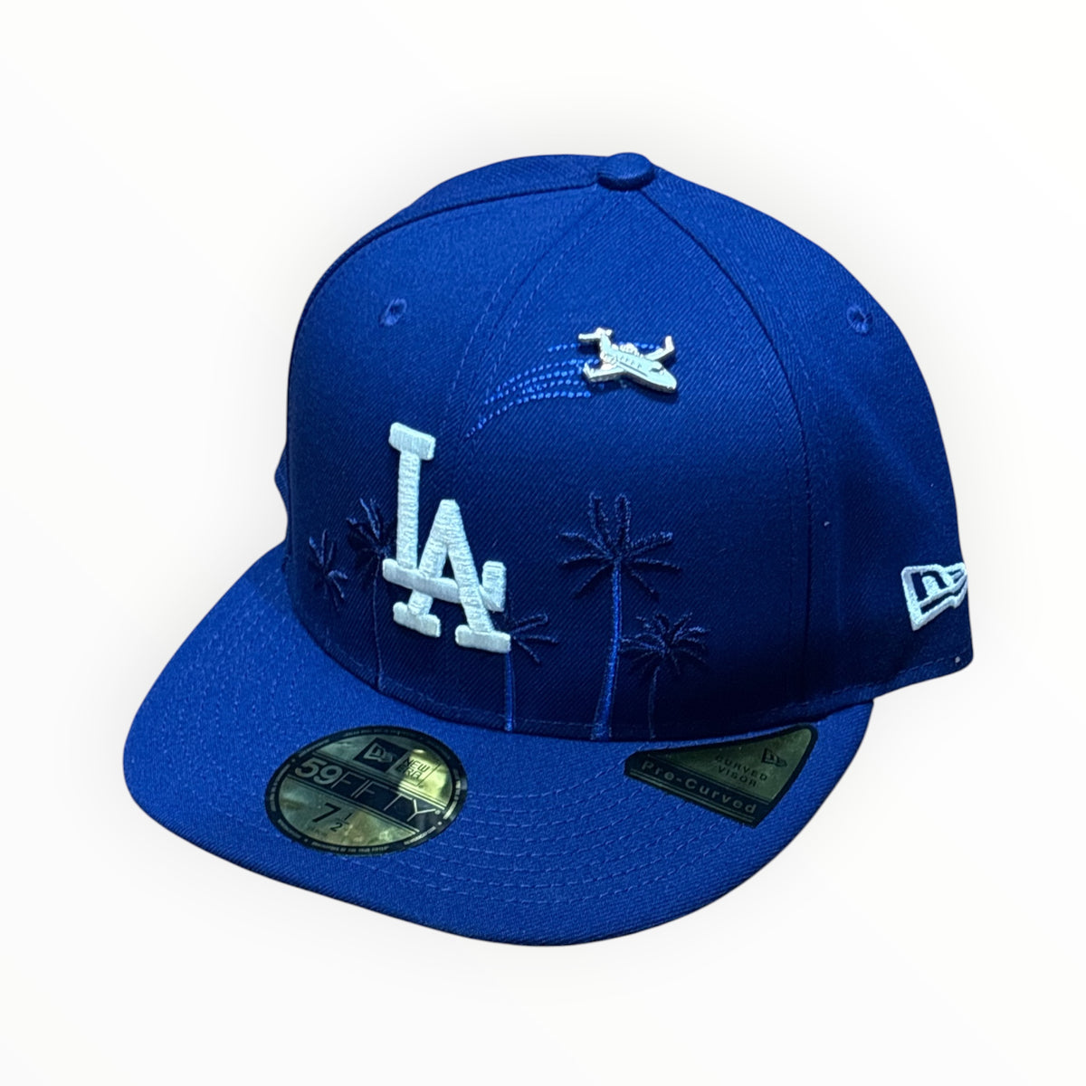 New Era Los Angeles Dodgers royal blue 59FIFTY fitted hat with palm embroidery, airplane pin and pre-curved visor