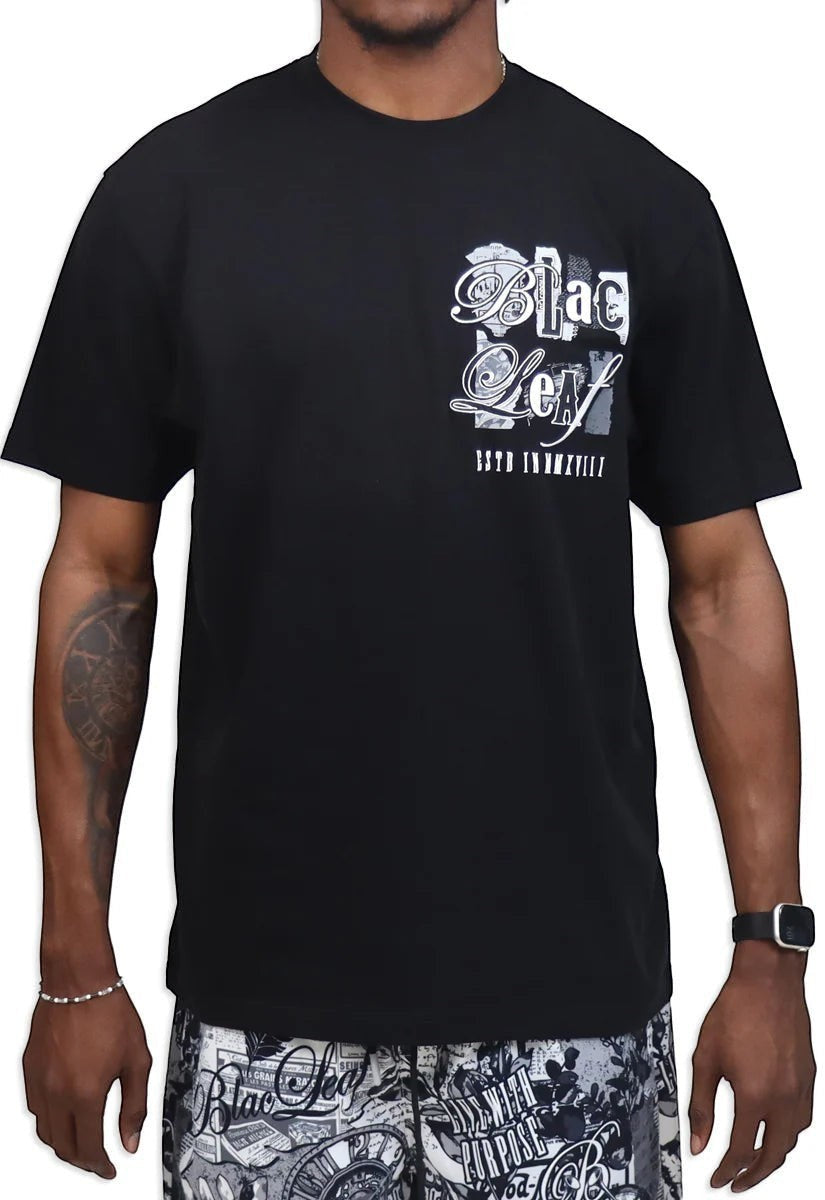 On Time Fashions black cotton t-shirt with a graphic print on the chest.