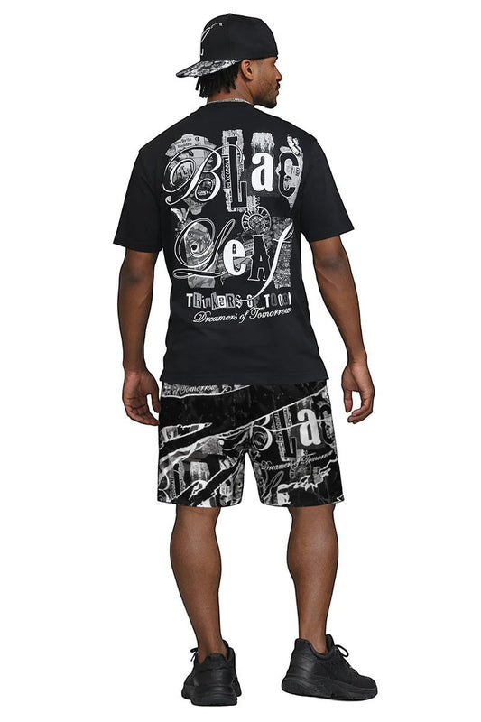 On Time Fashions black cotton t-shirt with large graphic print on back, paired with matching shorts.