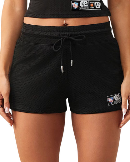 On Time Fashions black mesh shorts with adjustable drawcord and logo patch. Lightweight and lined for comfort.