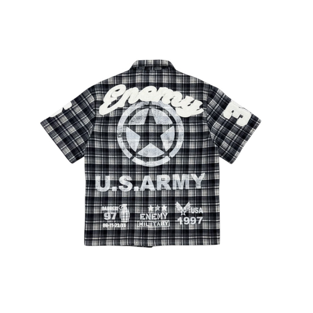 On Time Fashions blue and black plaid flannel shirt with U.S. Army graphic and grey long sleeves.
