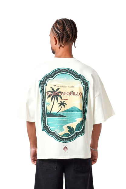 On Time Fashions cream oversized cotton tee with a vintage Caribbean beach print on the back.