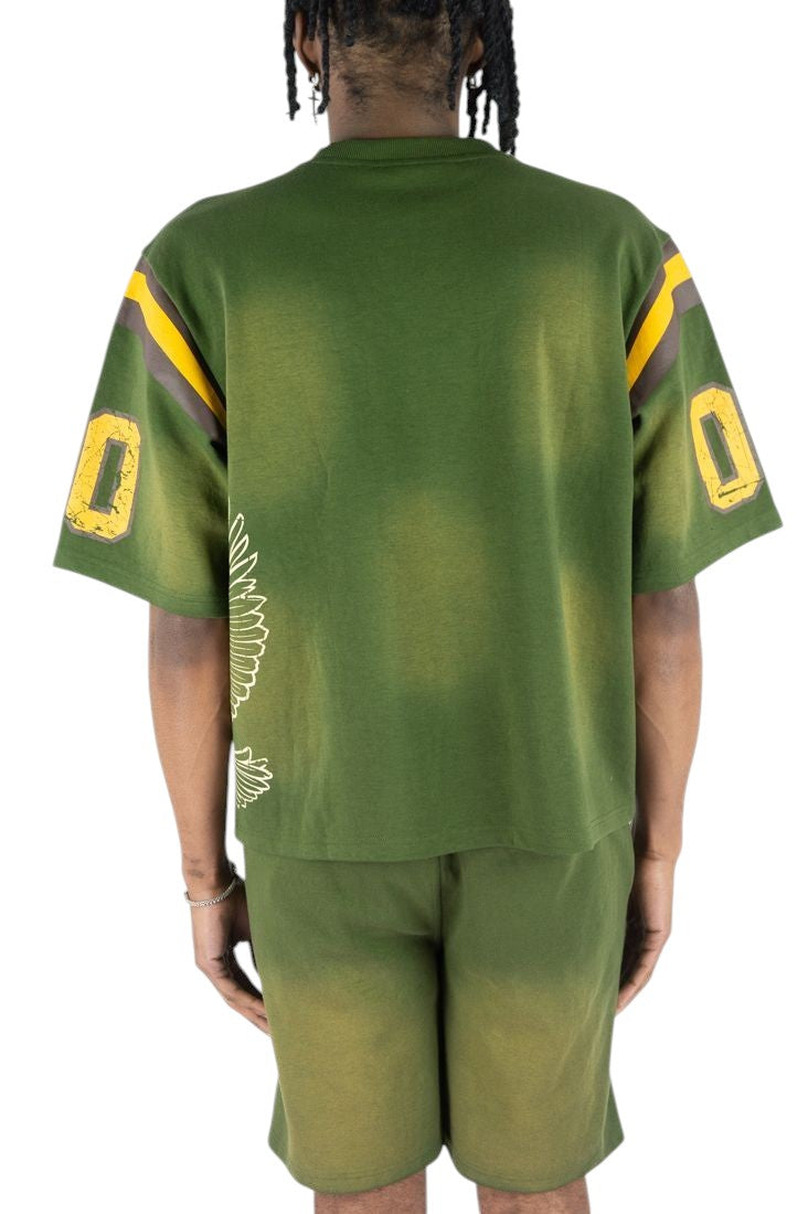 On Time Fashions green jersey with yellow and brown stripe details on sleeves and distressed '0' graphics.