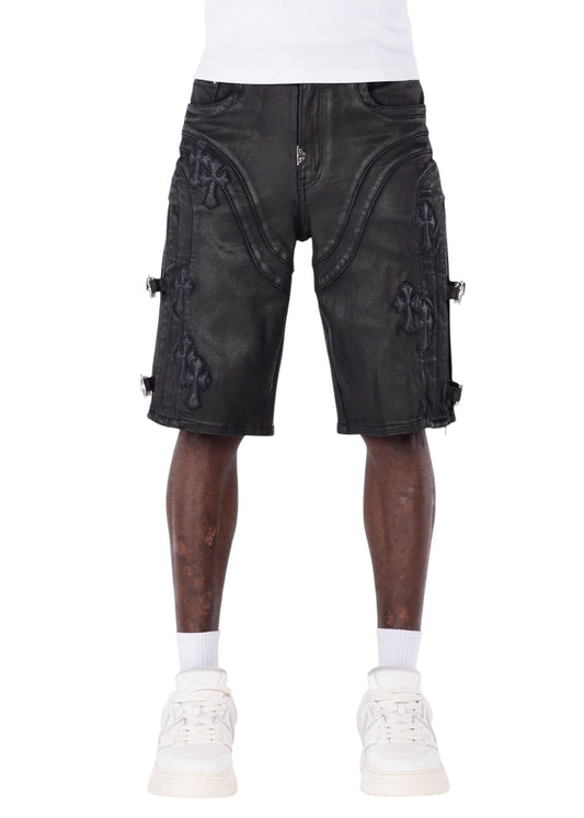On Time Fashions Guapi all black denim shorts with cross appliqué, utility side straps, and metal hardware detailing.