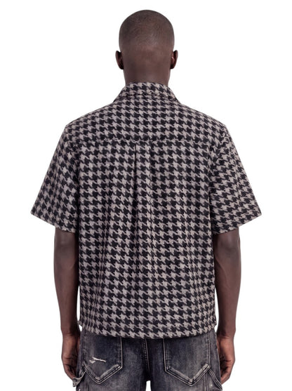 On Time Fashions Guapi black and gray houndstooth short-sleeve furry shirt worn by a model, back view.