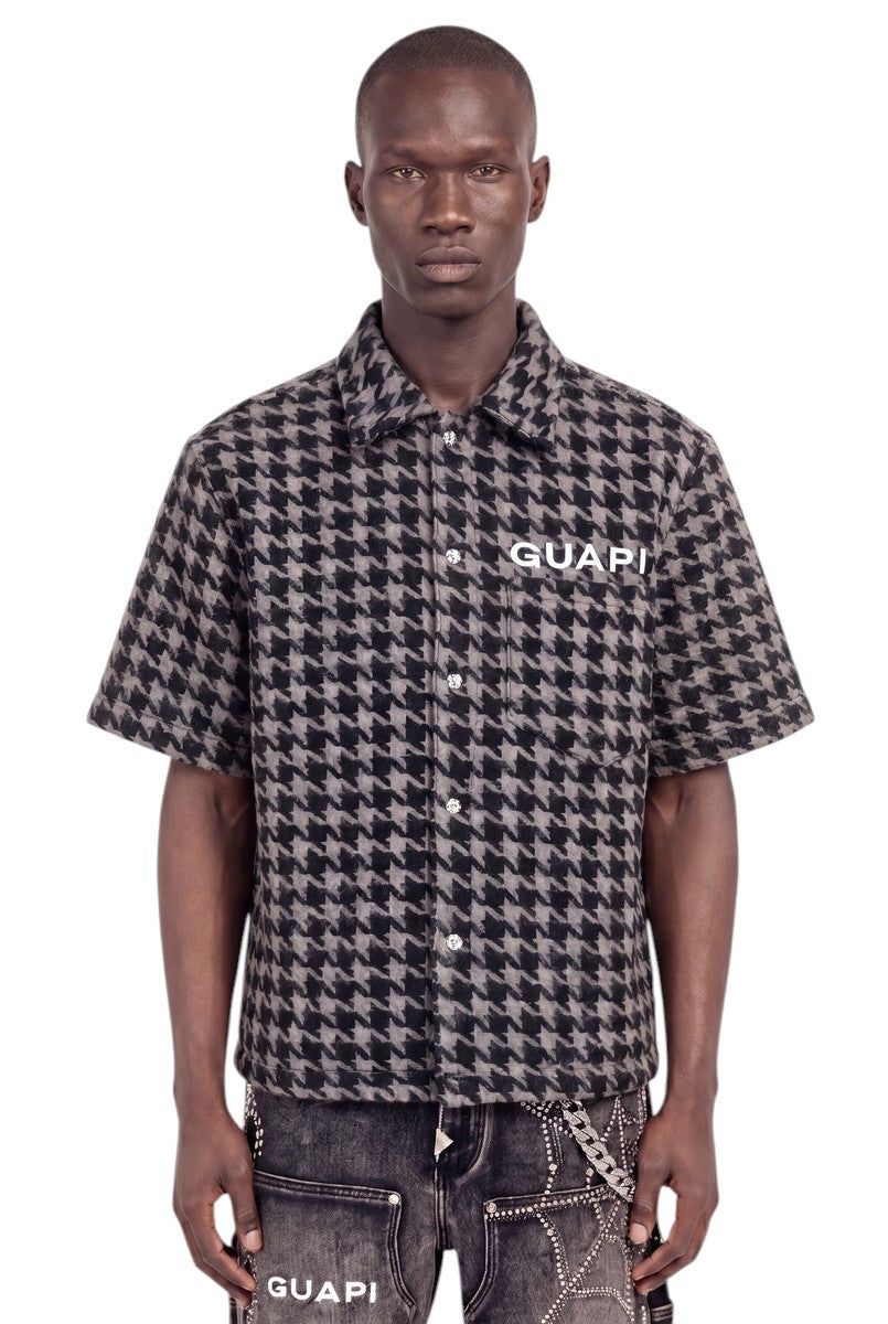 On Time Fashions Guapi black and gray houndstooth short-sleeve faux-fur shirt with chest logo on a male model