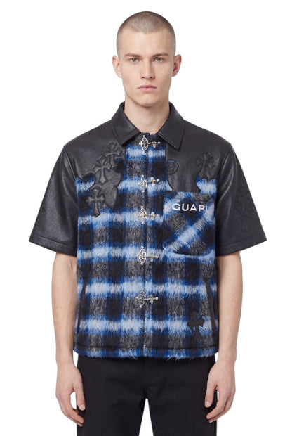 On Time Fashions Guapi Midnight Sky short-sleeve shirt with blue plaid texture, leather sleeves, and cross patches.