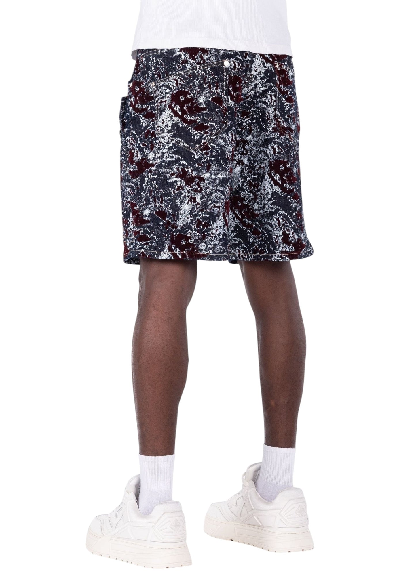 On Time Fashions Guapi wine red velvet shorts with laser-etched abstract marble pattern, back view on a model.