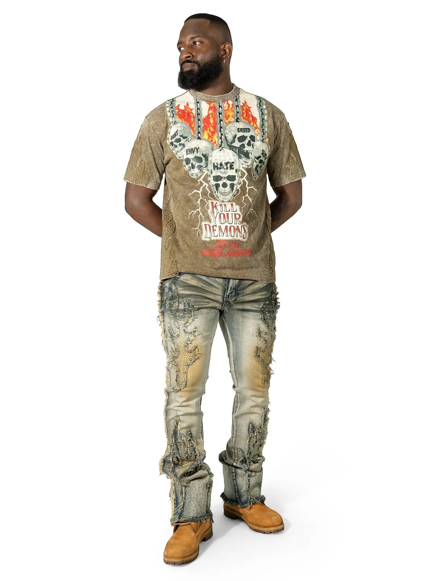 On Time Fashions Makobi Tesoro Tee in tan with a graphic print of skulls and flames, featuring distressed details and stud embellishments.