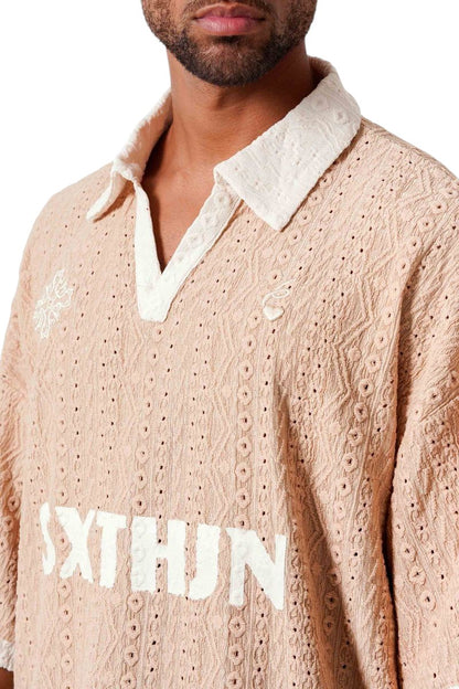 On Time Fashions men's short-sleeved peach crochet polo shirt with white collar and embroidered logo.