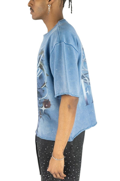 On Time Fashions Rebel Minds blue French terry crop tee with embellished Medusa graphic and raw hem on a male model.