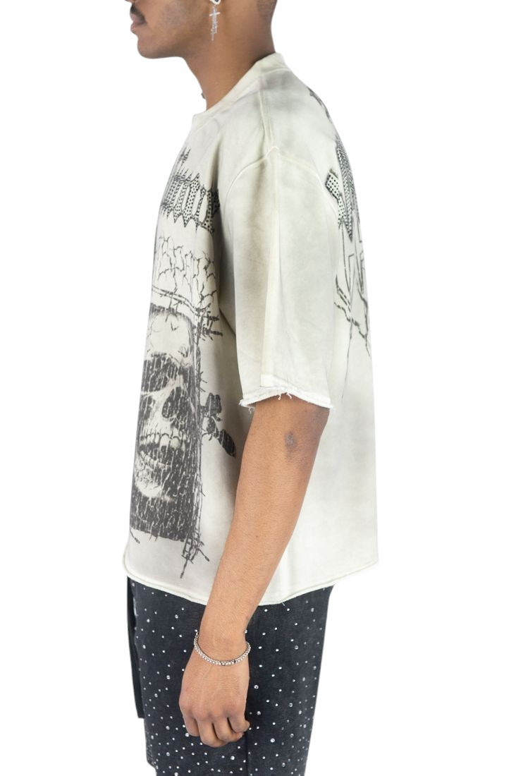 On Time Fashions Rebel Minds Whispers cream heavyweight crop tee with black skull graphic and raw hem detail.
