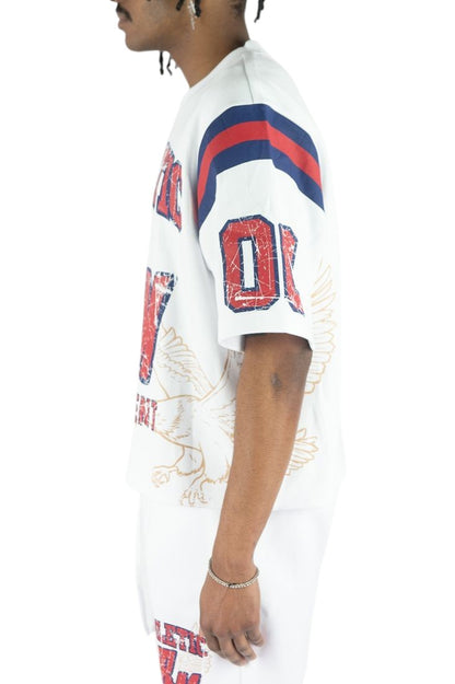 On Time Fashions white jersey with red and blue stripes on sleeves, featuring distressed "01" graphic and eagle print.